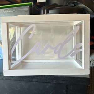 Clear acrylic box. Was used for wedding. “Card” wording can be removed.
